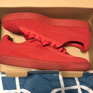 Red low-top pumas